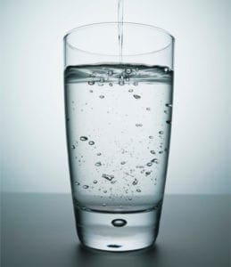 Water being poured into the glass